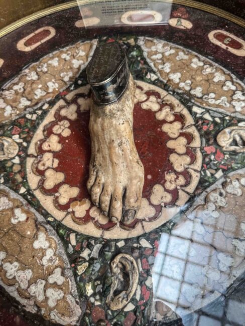 This table is formed of brains, blood, bile, liver, lungs on which stand a foot, four ears and vertebrae cut off also petrified